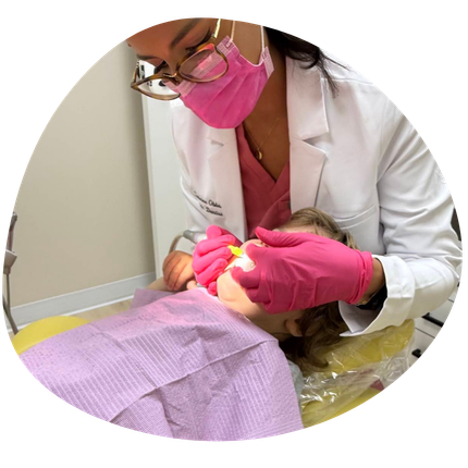 Progetto senza titolo (9) Dr Sabrine obbad, kid dentist extracting a tooth